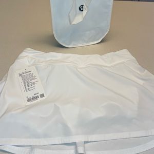 Lululemon play off the pleats mid-rise skirt size 12